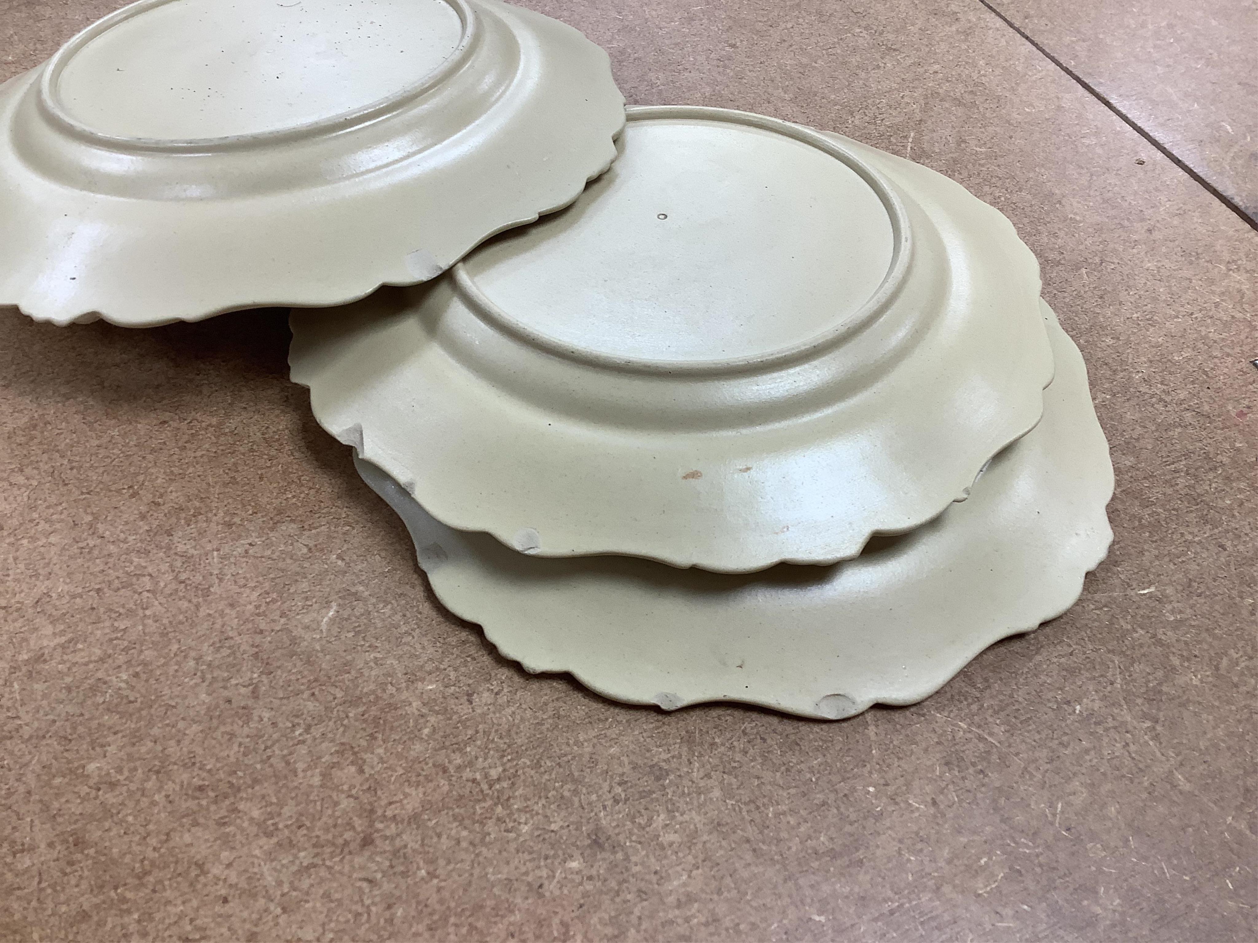 A Victorian drabware part dessert set, comprising eleven plates and three two handled dishes, dishes 25cm wide